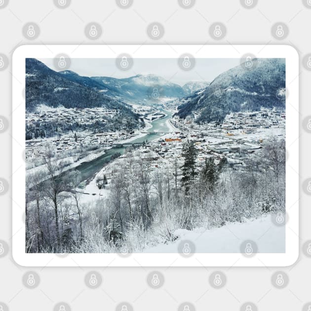 Wintertime - View on Snow-Covered Scandinavian Valley and Town Sticker by visualspectrum